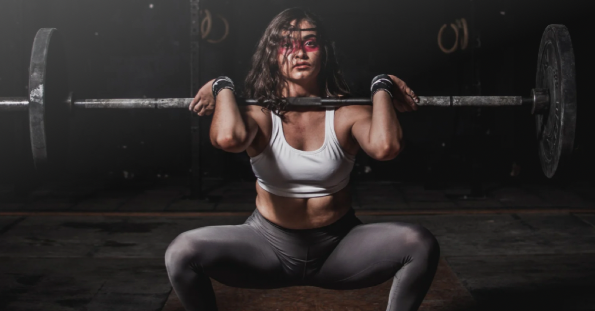 woman with a barbell